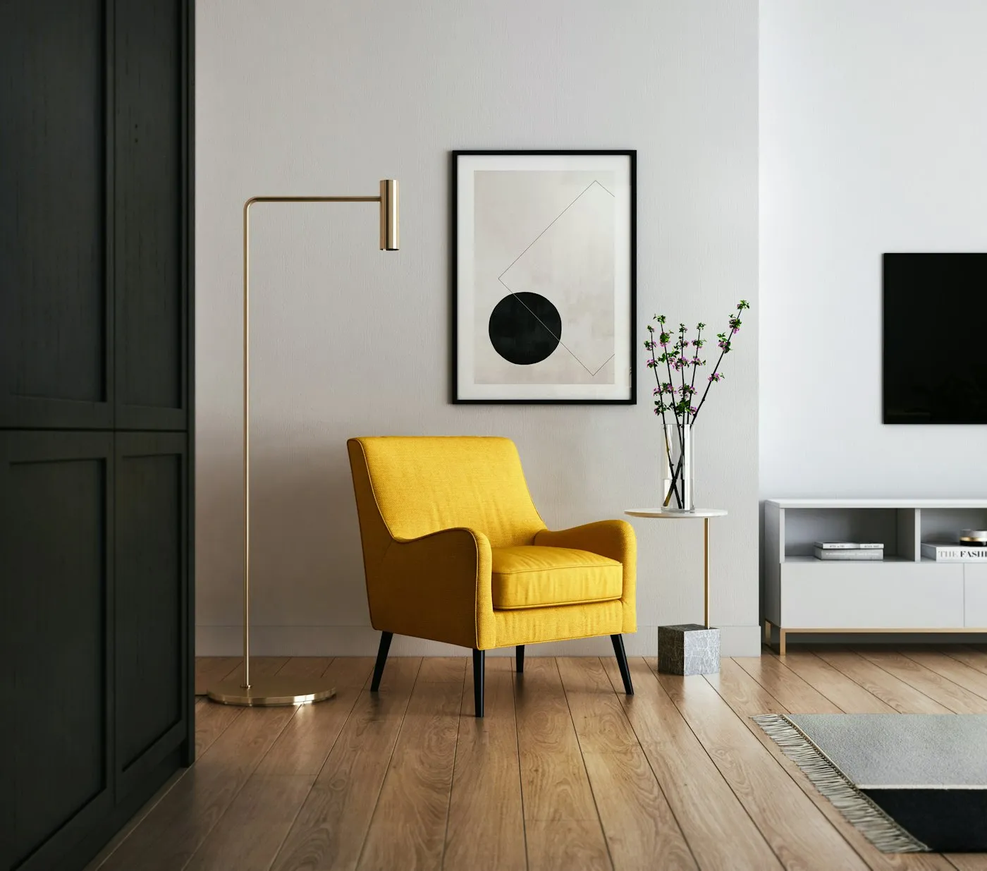 Minimal living room with a yellow armchair, floor lamp and framed print